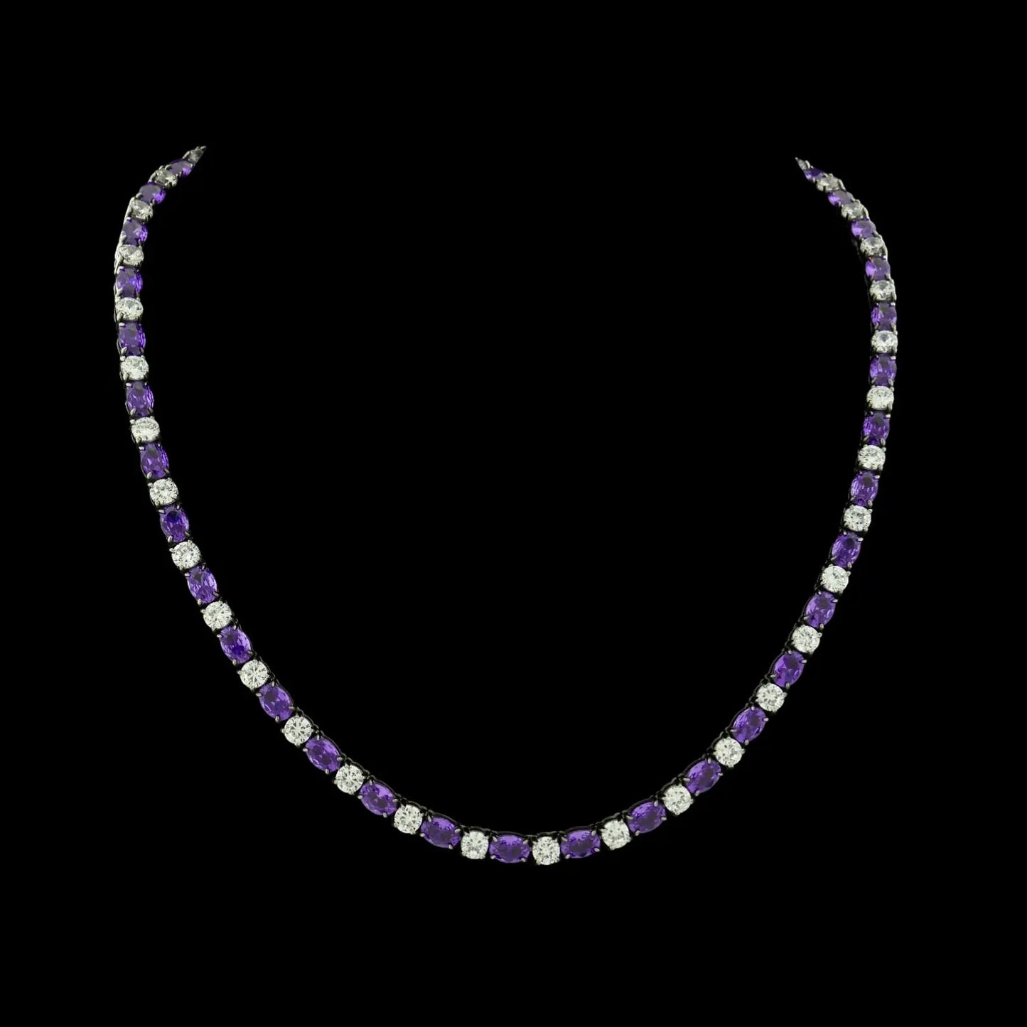 RVS tenniscollier met ovale paarse zirkonia stenen 4 mm