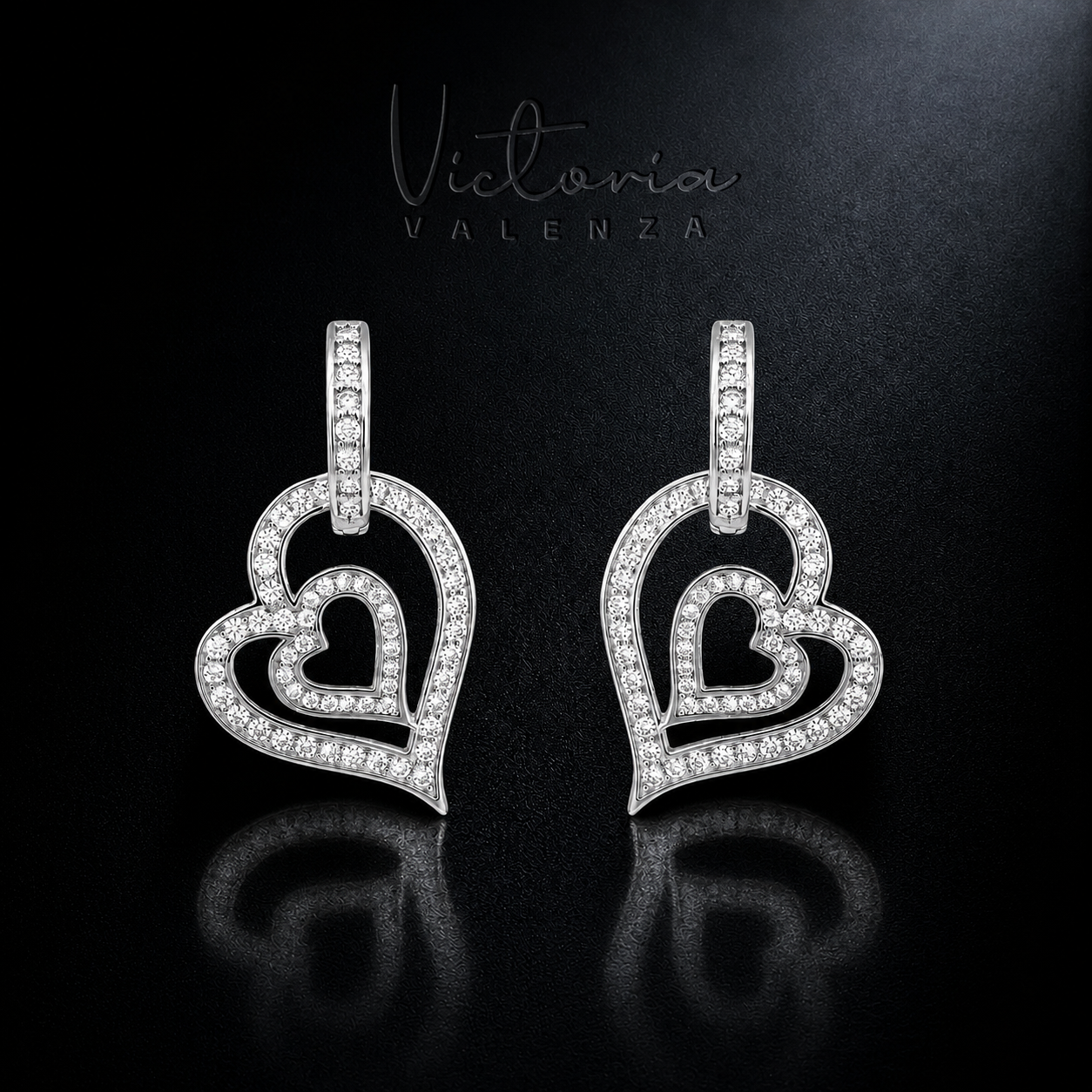Zilverkleurige Amore Oorbellen met Zirkonia Stenen | Victoria Valenza