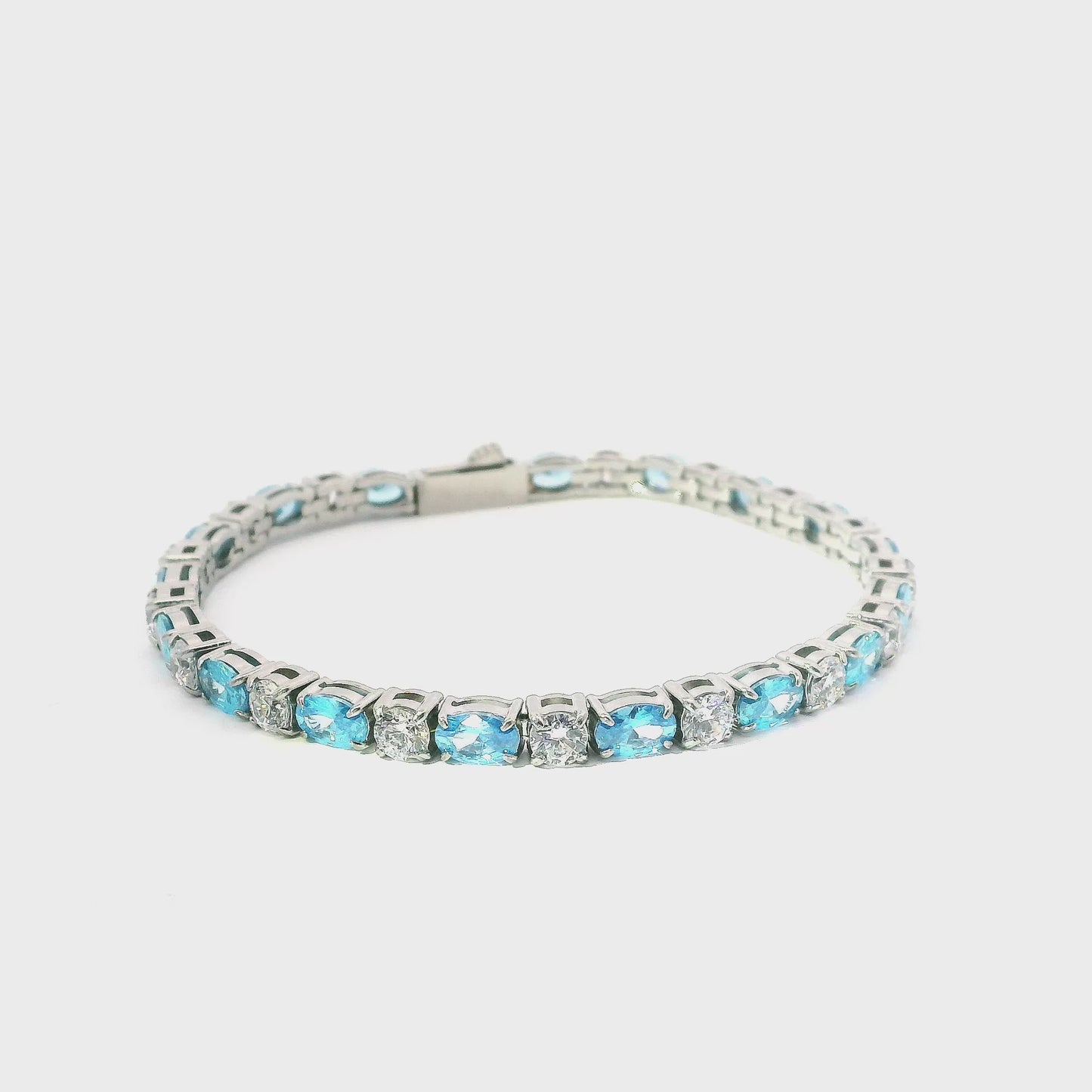 Bracelet tennis en acier inoxydable avec pierres de zircone bleues et blanches