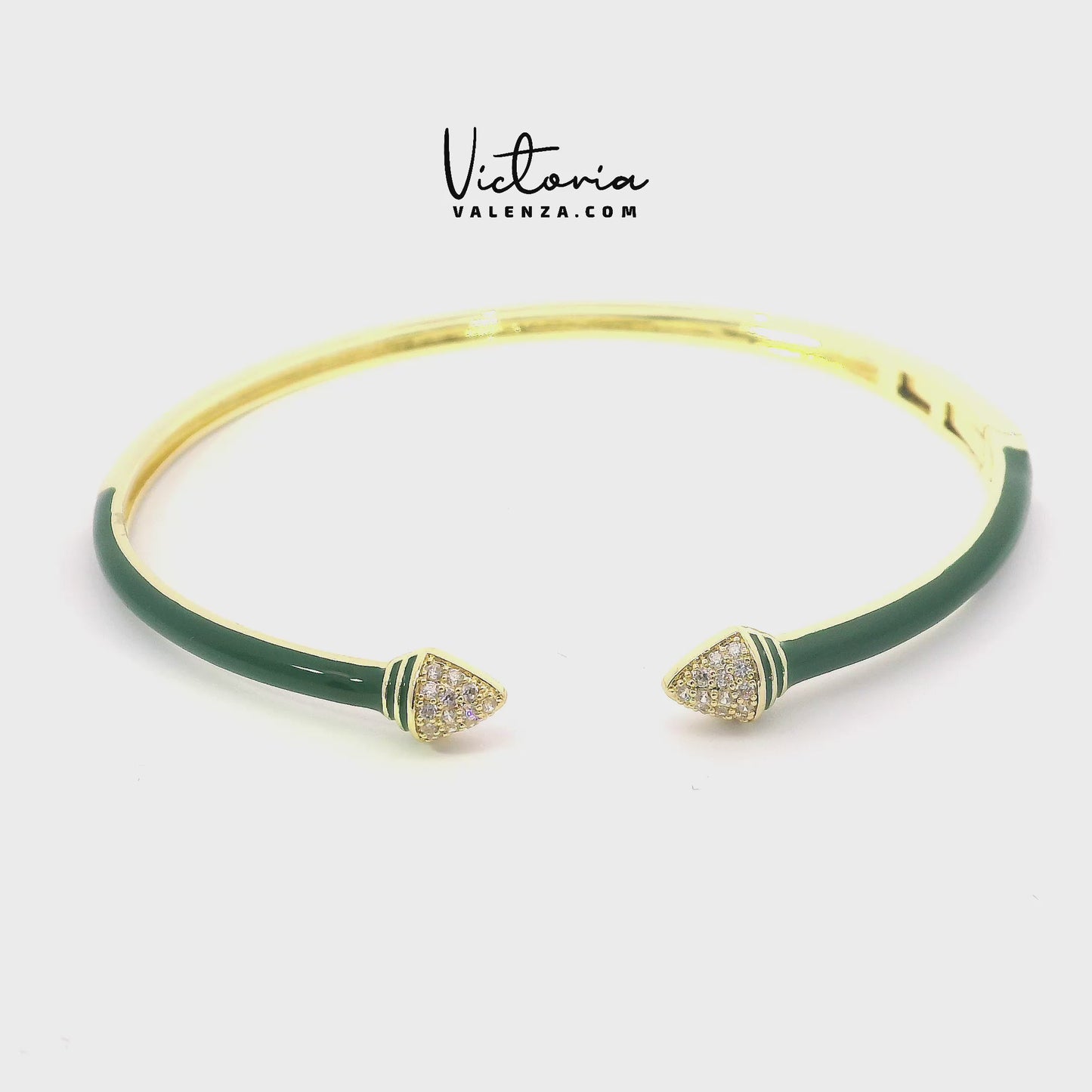 Bracelet couleur or avec émail vert et pierres de zircone