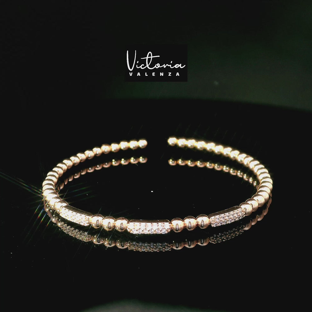 
                      
                        Charger et lire la vidéo dans la visionneuse de la galerie, Bracelet flexible à billes couleur or rose avec pierres en zircone
                      
                    