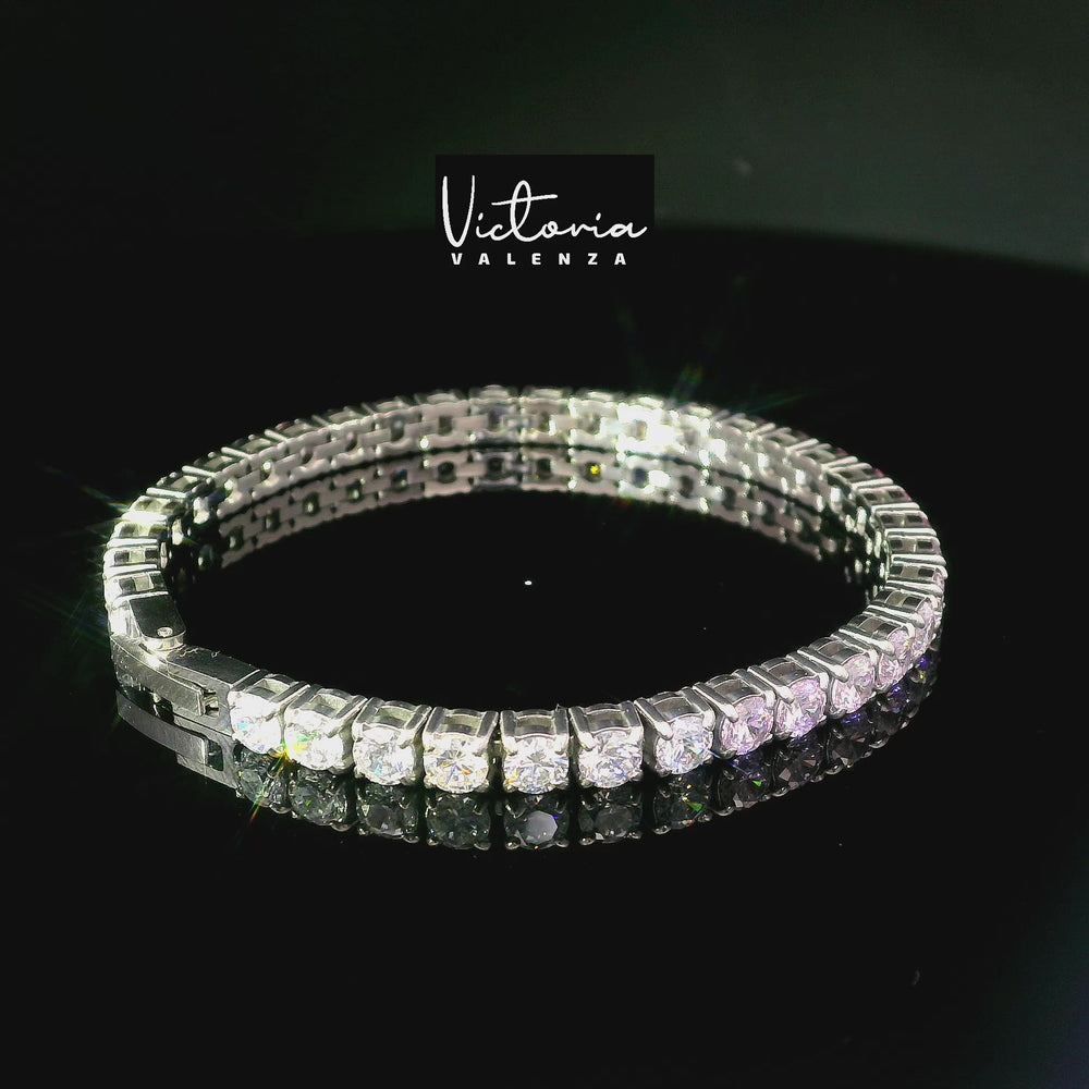 
                      
                        Charger et lire la vidéo dans la visionneuse de la galerie, Bracelet tennis en acier inoxydable avec pierres de zircone roses et blanches
                      
                    