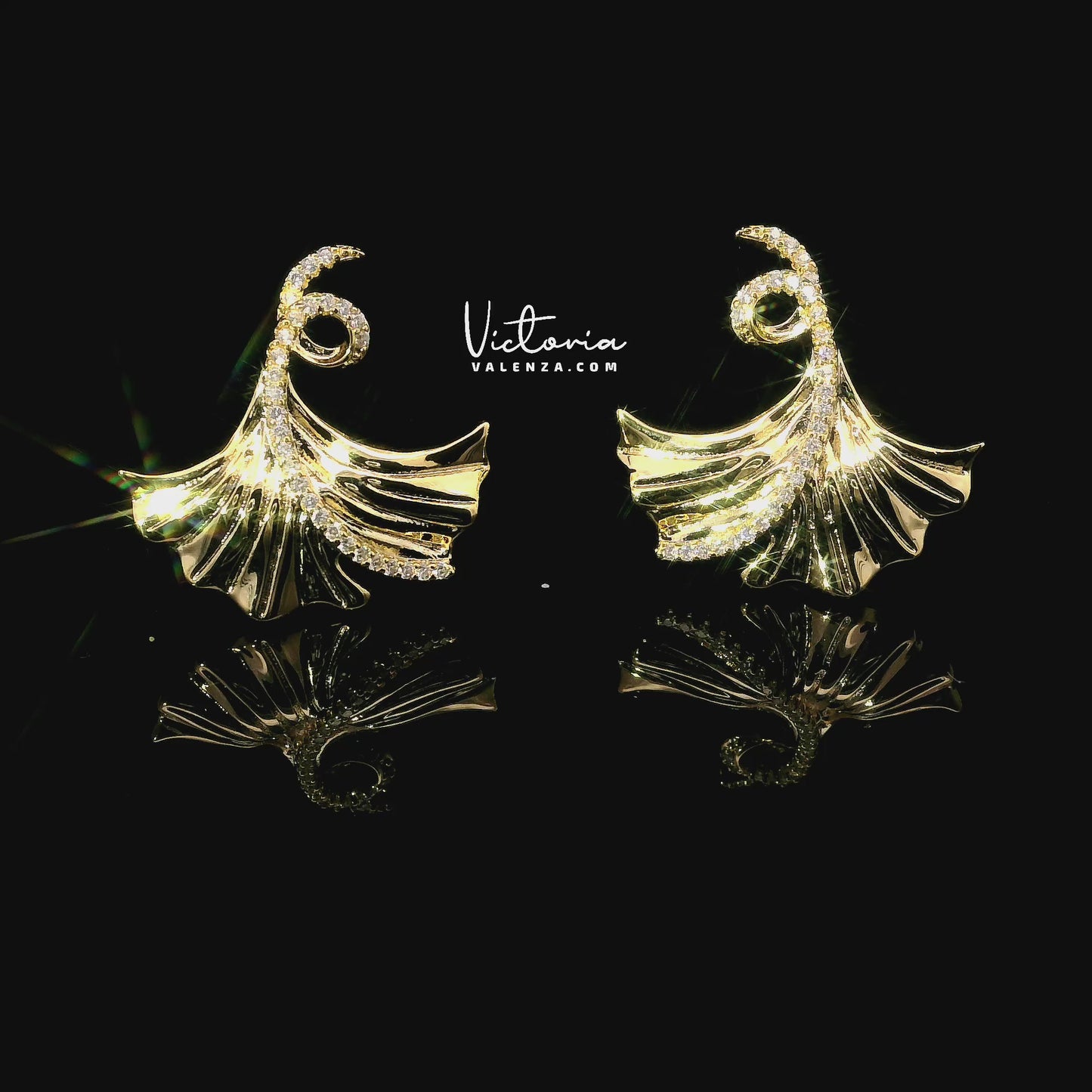 Boucles d'oreilles feuilles dorées avec pierres en zircone