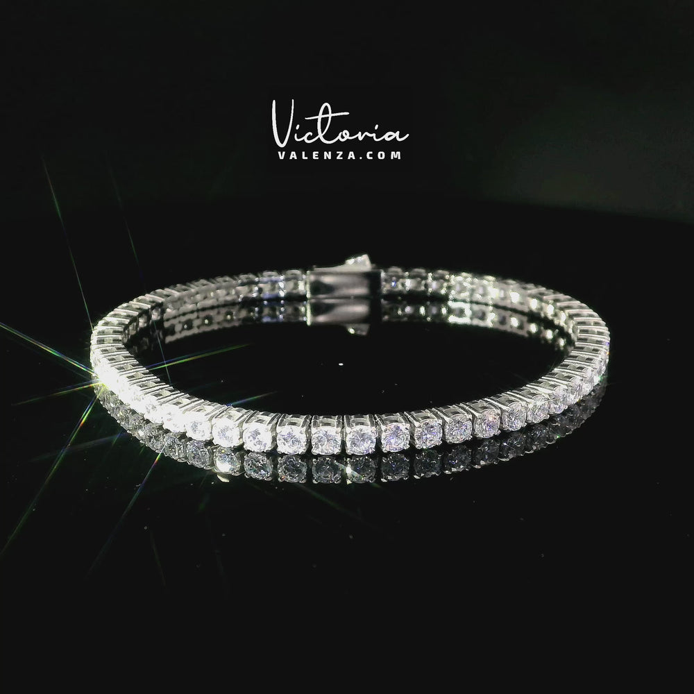 
                      
                        Charger et lire la vidéo dans la visionneuse de la galerie, Bracelet de tennis en acier inoxydable avec pierres en zircone
                      
                    
