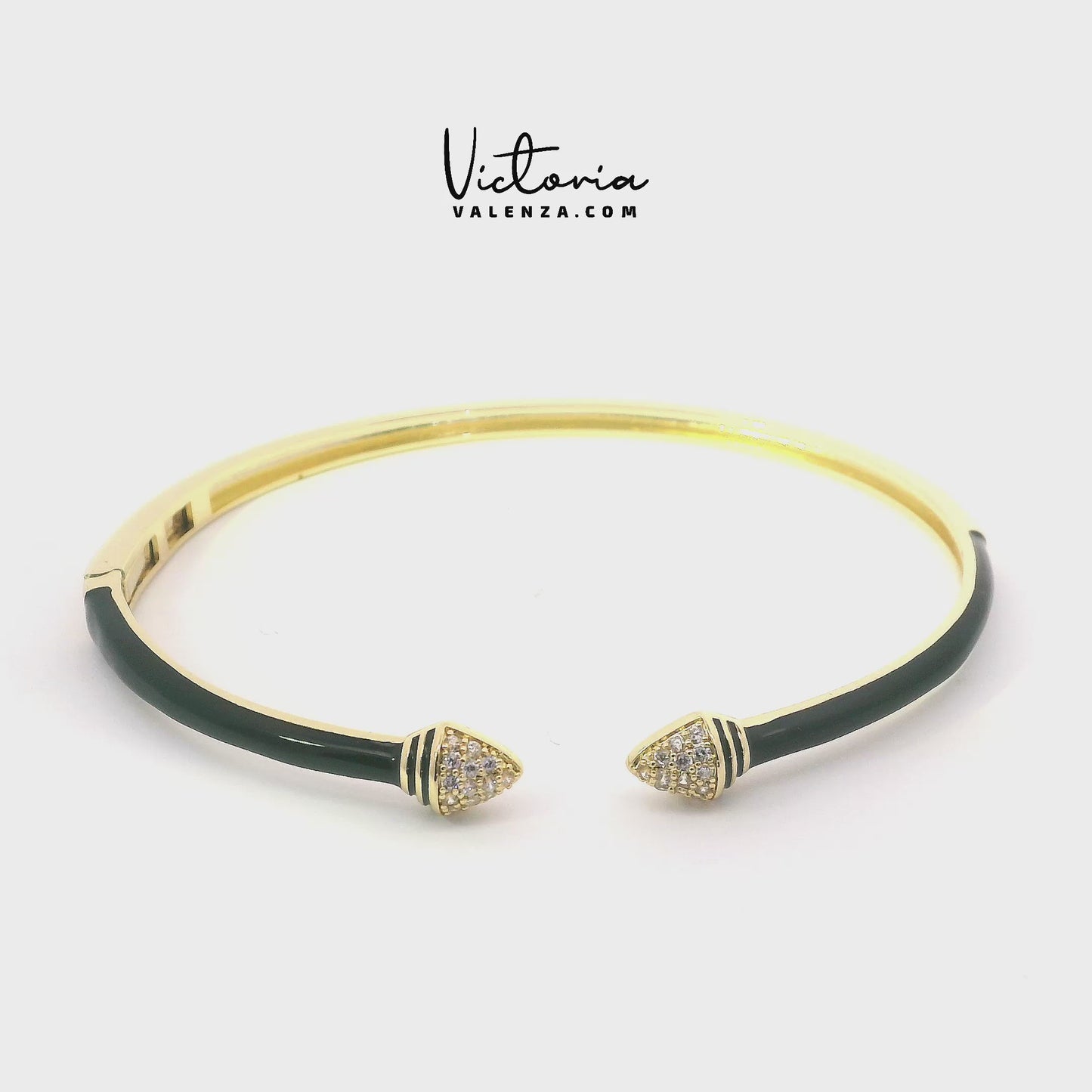 Bracelet couleur or avec émail noir et pierres de zircone