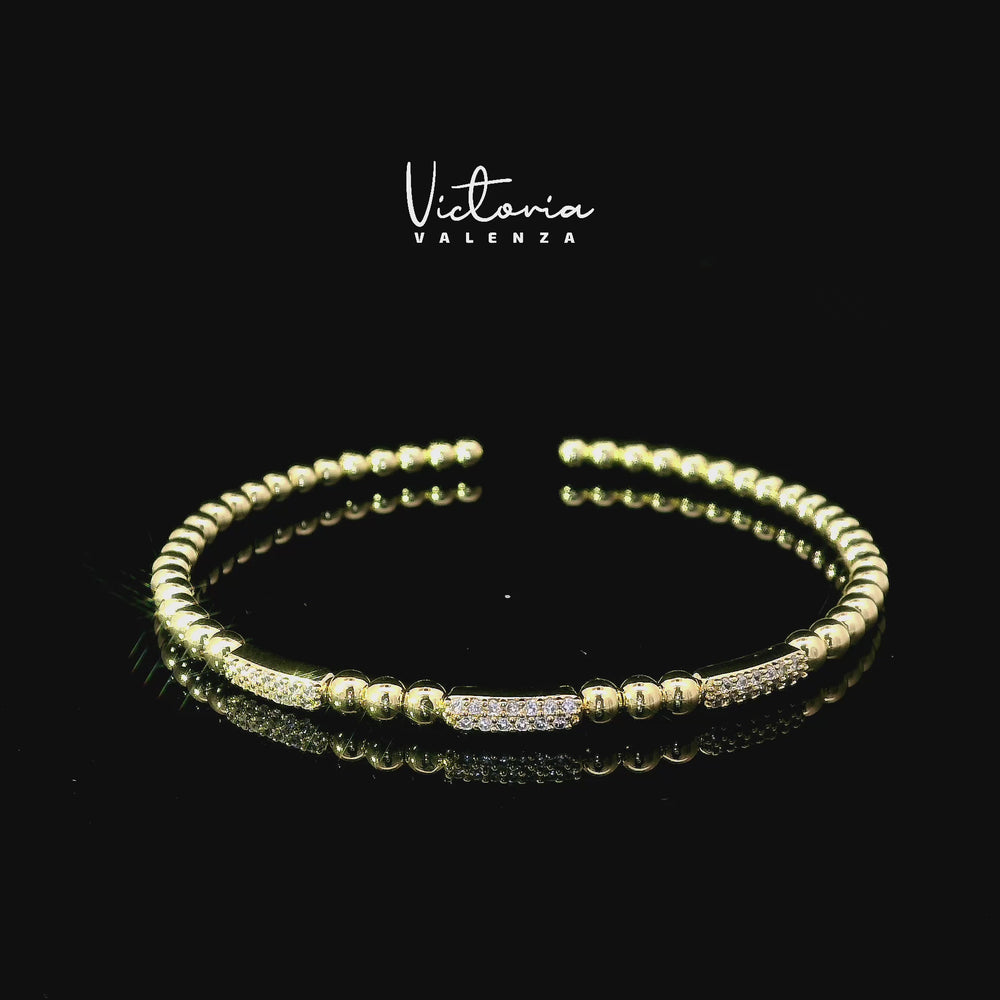 
                      
                        Charger et lire la vidéo dans la visionneuse de la galerie, Bracelet flexible à billes couleur or avec pierres en zircone
                      
                    