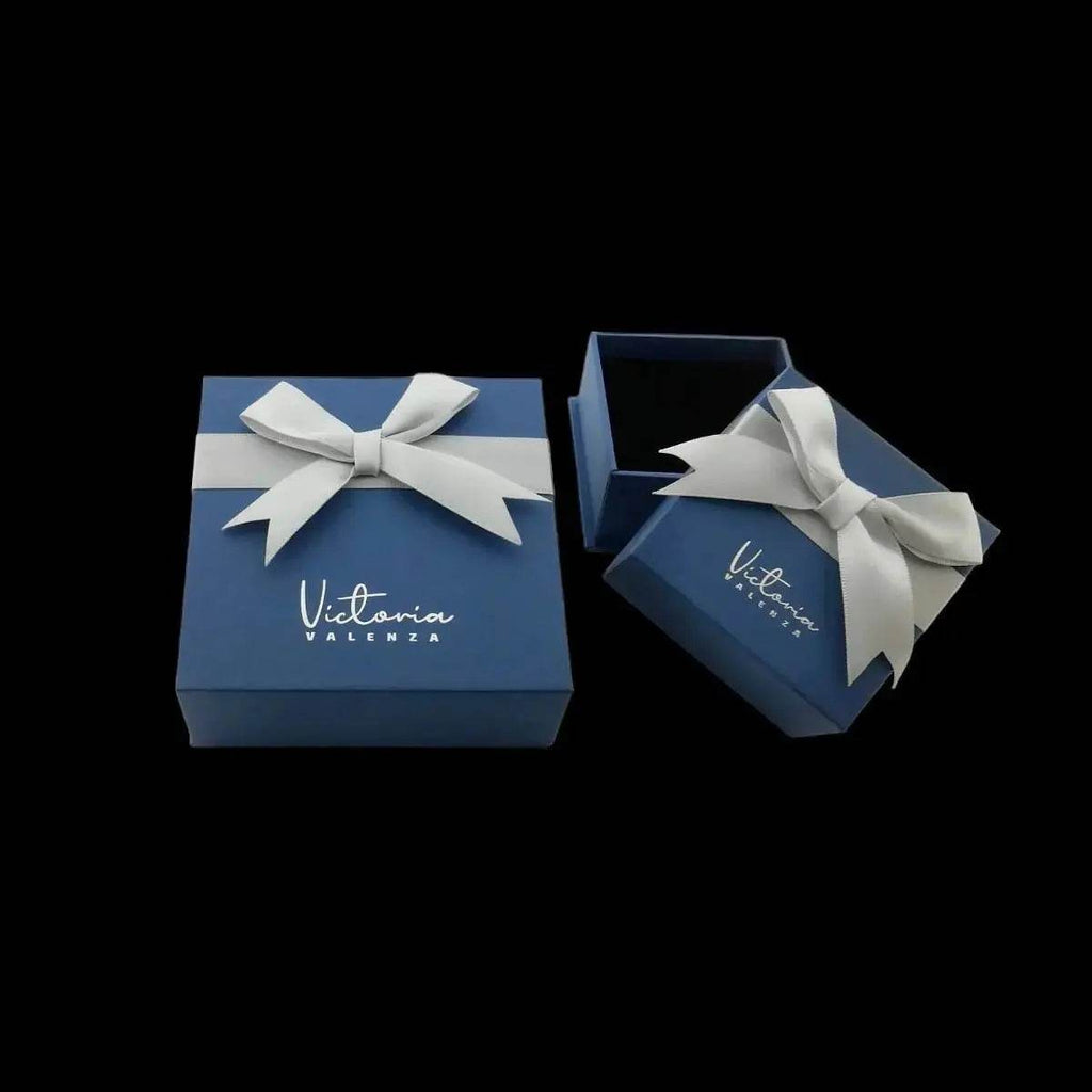 Goudkleurige bladvormige oorbellen met groene zirkonia's - Victoria Valenza