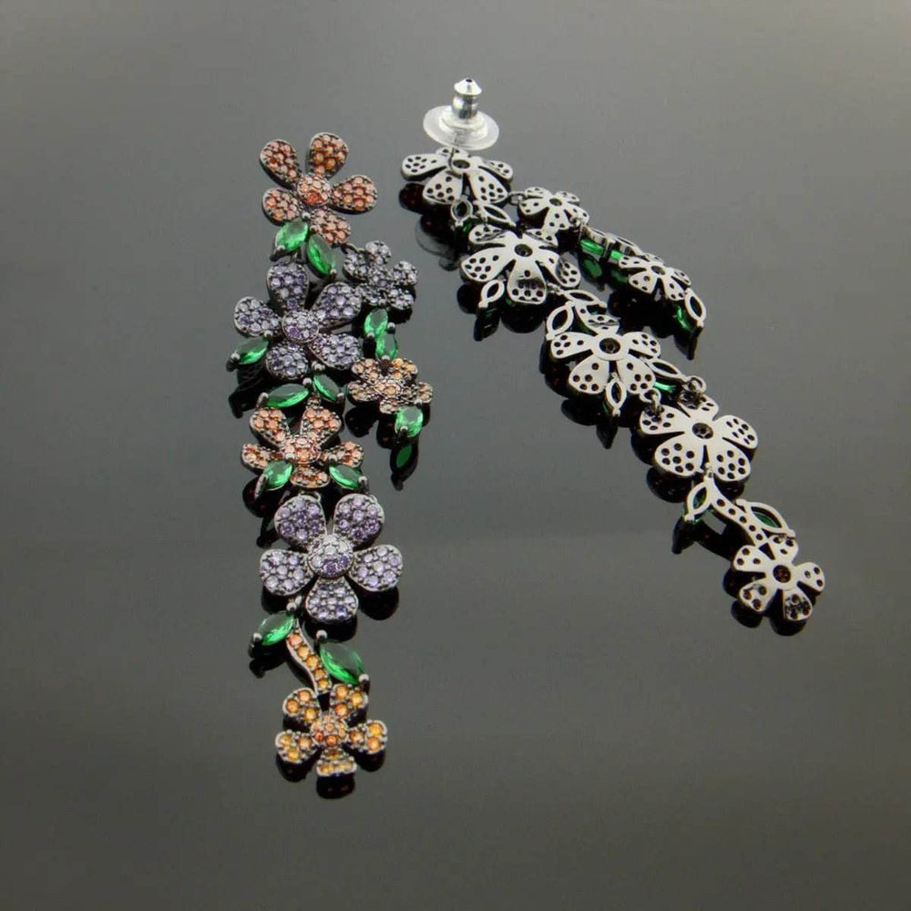 
                      
                        Lange bloem oorbellen met multicolor zirkonia's - Victoria Valenza
                      
                    