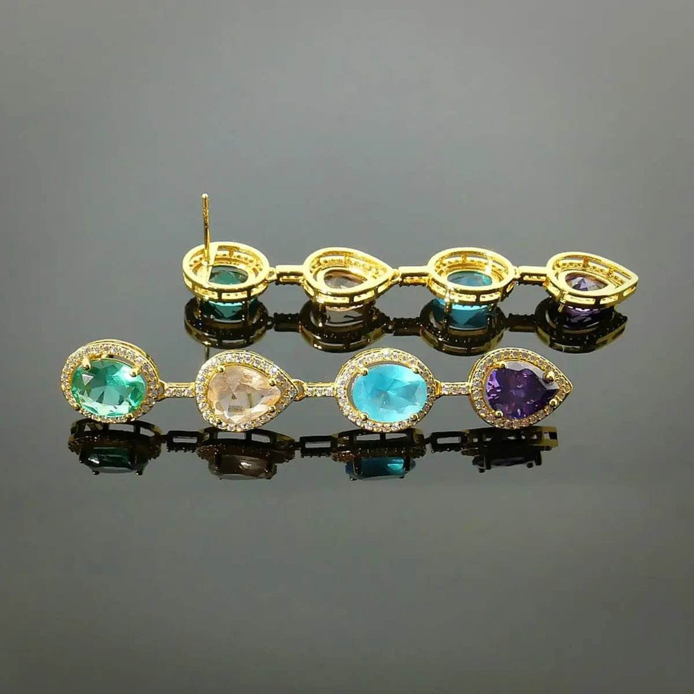 
                      
                        Goudkleurige Luna oorbellen met multicolor zirkonia's - Victoria Valenza
                      
                    
