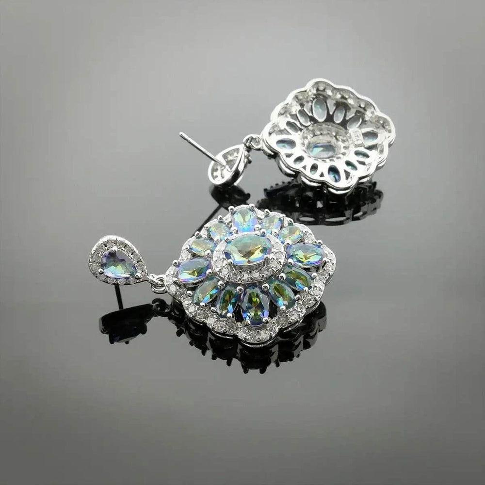 
                      
                        Zilverkleurige druppel oorbellen met multicolor zirkonia's - Victoria Valenza
                      
                    